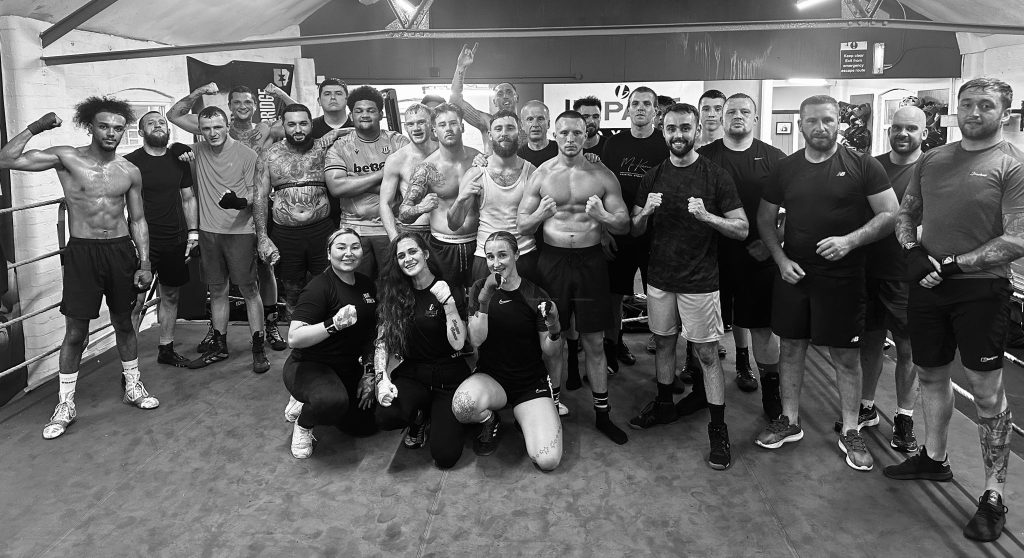Boxer having his hand raised after a bout